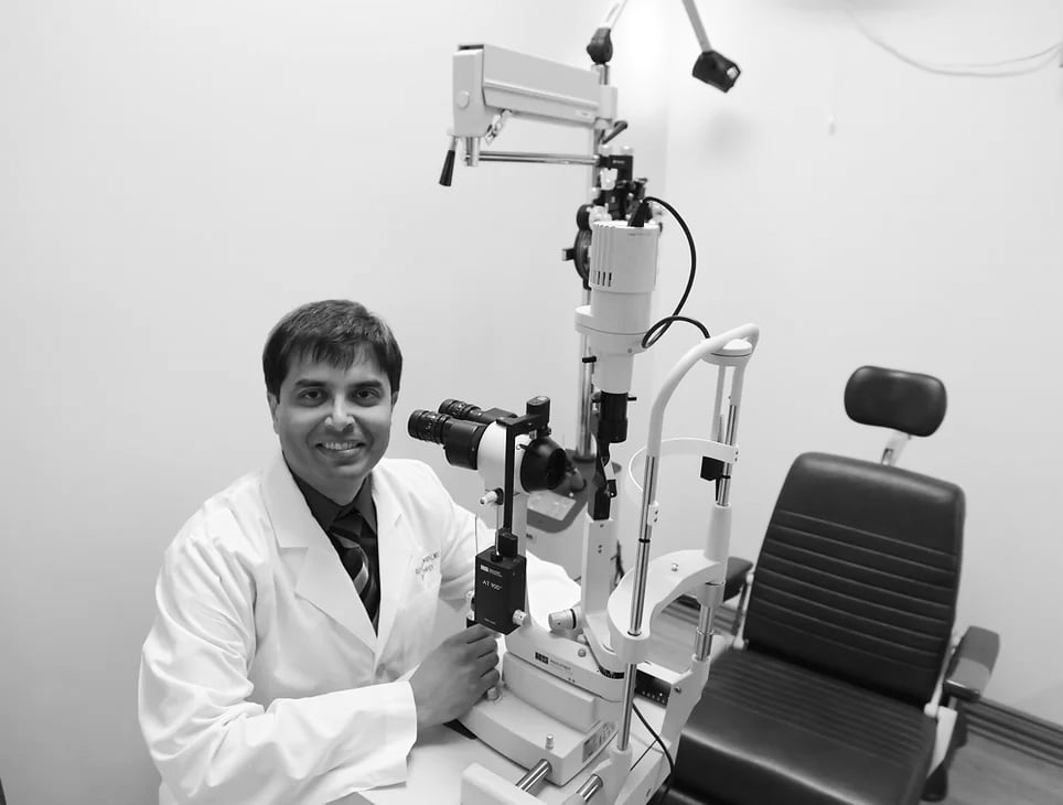 Dr. Rajiv Rugwani Performing an Eye Exam